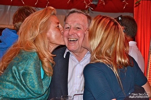 Farr 40 sailors Linda Lindquist-Bishop and Sarah Okane plant kisses on the cheeks of a surprised Fisher © William Wagner